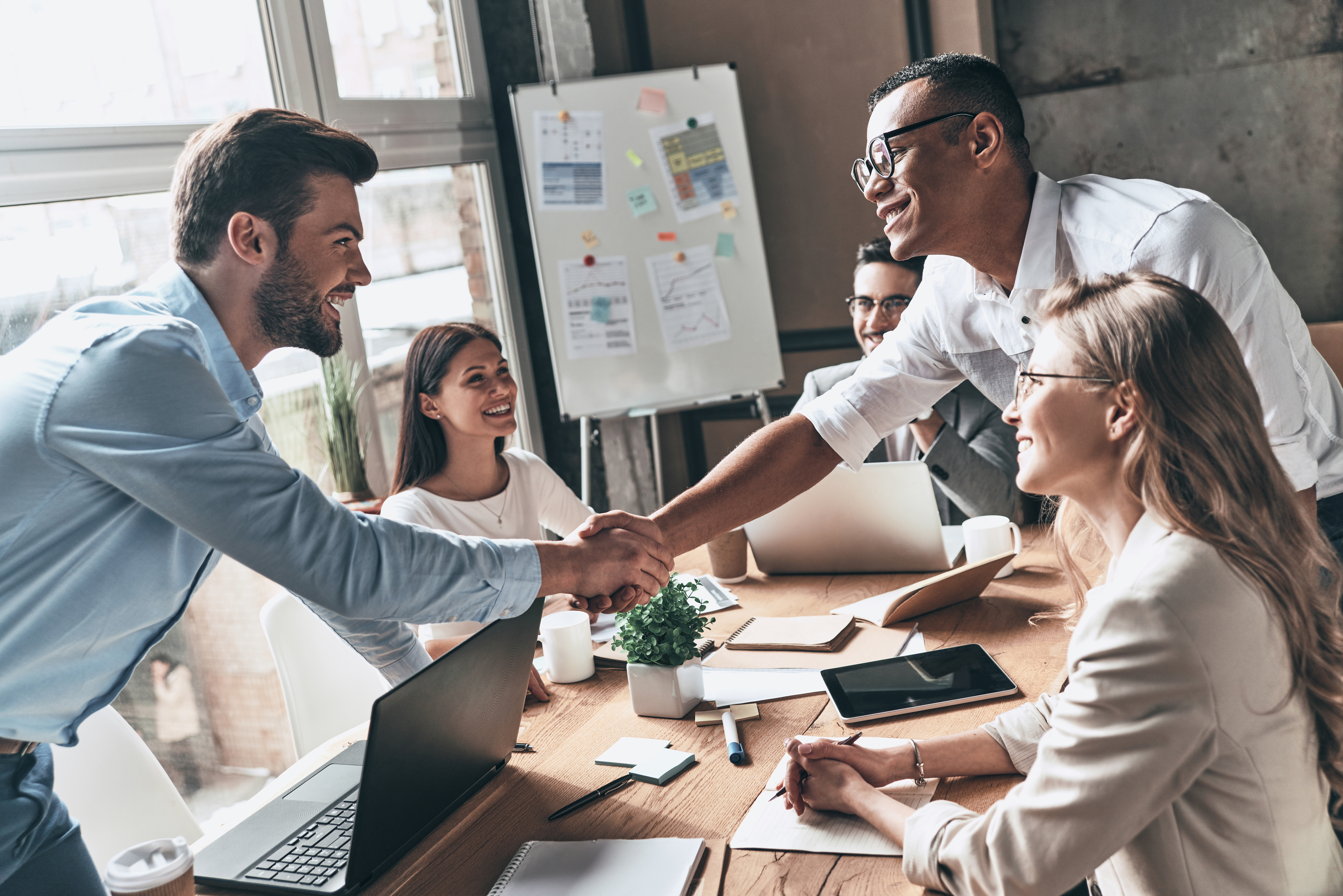 Business partners shaking hands