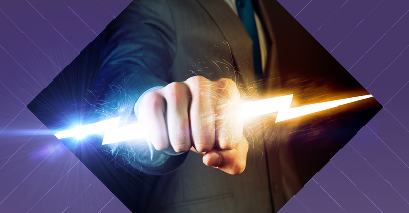 businessman grasping lightning bolt with fist