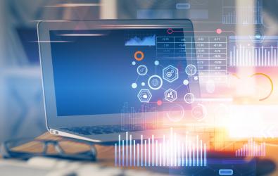 desktop computer with digital graphics inspired by the Sitecore logo