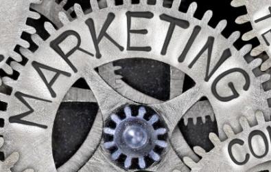 Marketing terms Strategy, Social Media, Digital, Marketing, Content, Technology, SEO, Advertising and Plan imprinted on interlocking gears.