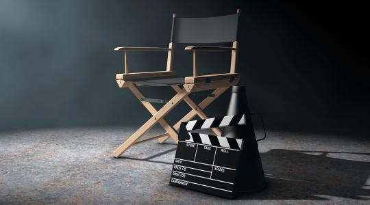 Director folding chair and clapper.