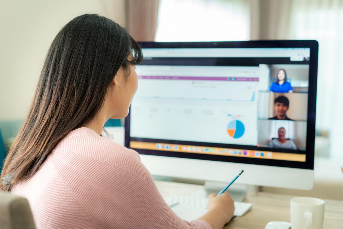 Woman using virtual collaboration software