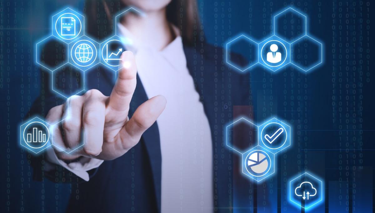 Woman touching icon on virtual screen.