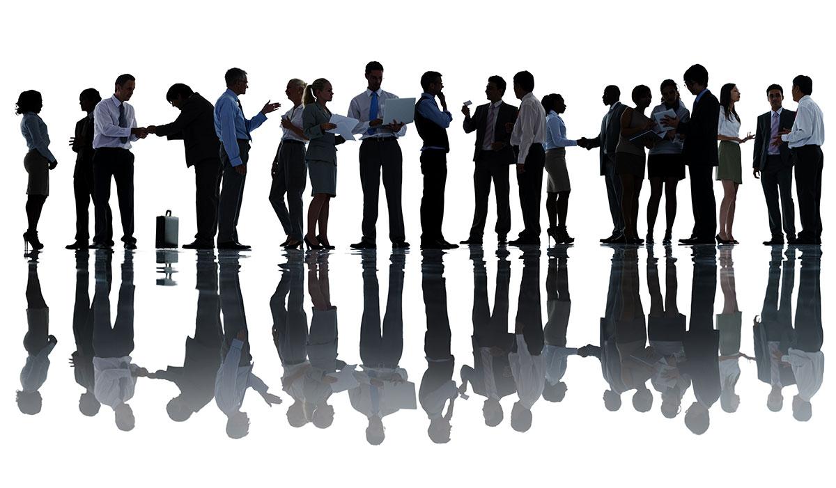 Silohuettes of working people in a line.